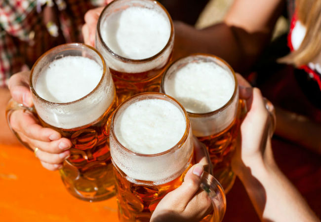 Clinking beers at the Hofbrauhaus | Shutterstock