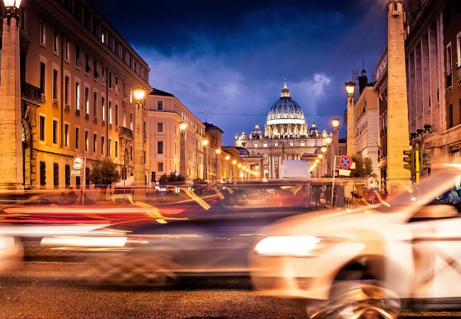 Streets of Rome under the city lights | In Green/Shutterstock